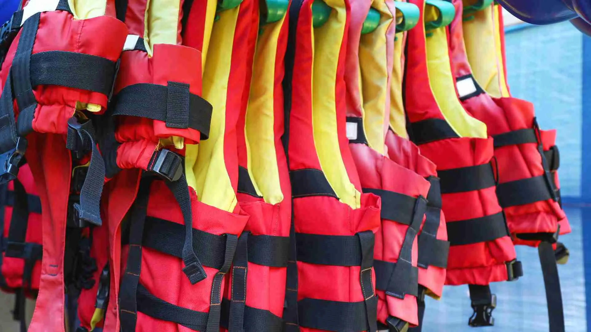 How do I choose the right life jackets for different passengers on my boat