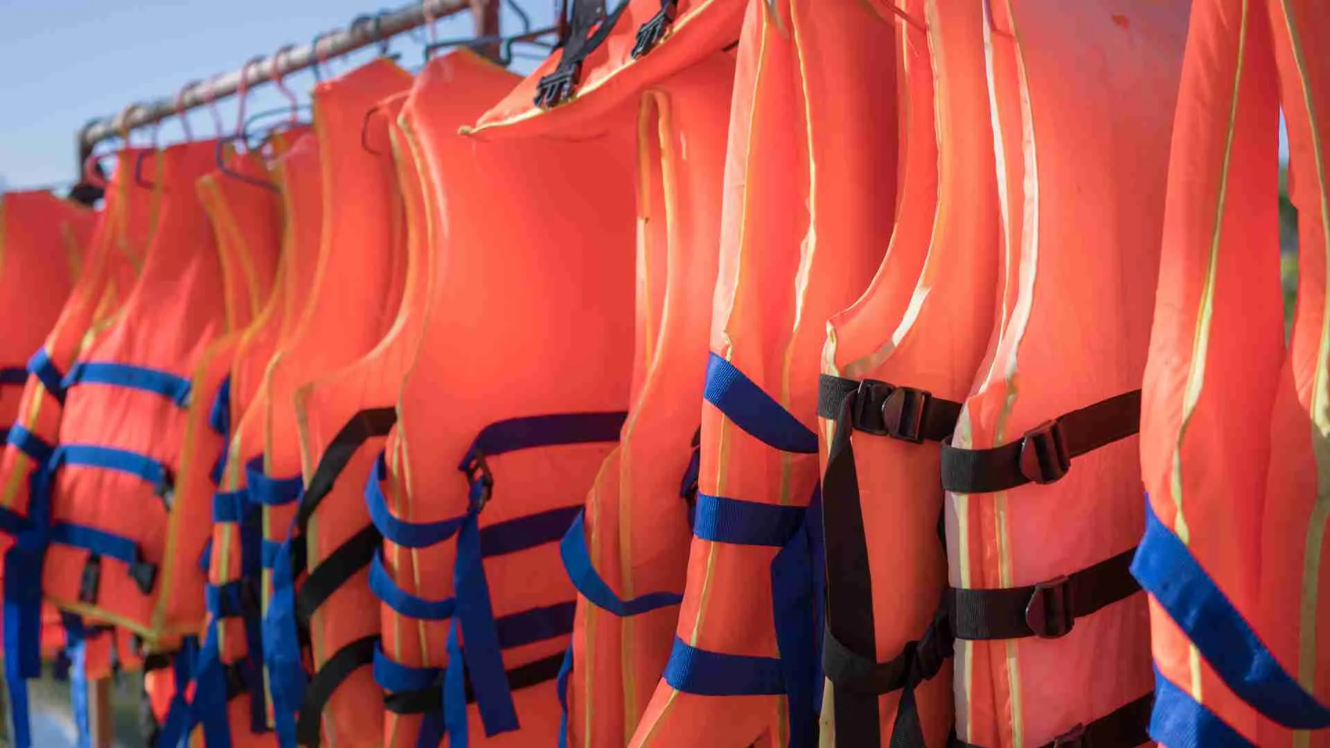 How do I choose the right life jackets for different passengers on my boat