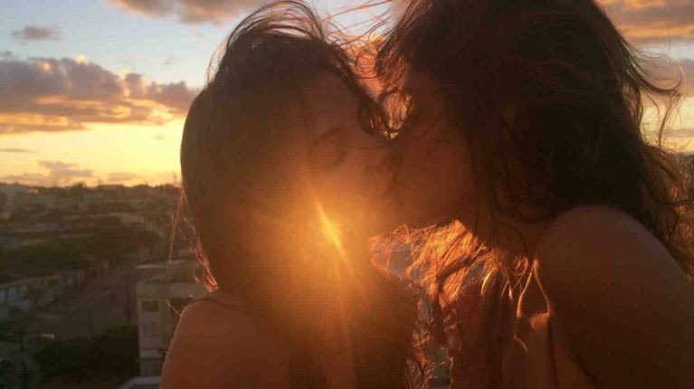 Brazilian Girls Kissing Under a Golden Sunset