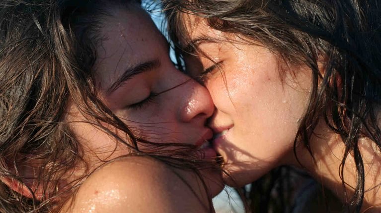 Love on the Waves: Brazilian Girls Kissing